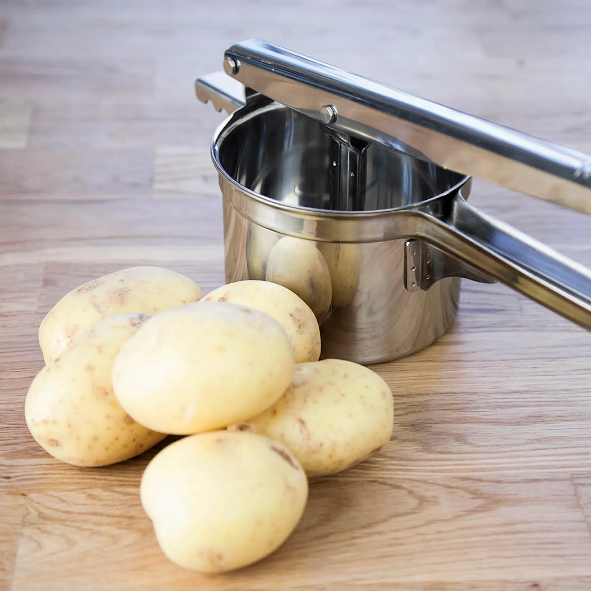 Exxent Potatispress 34 cm stål
