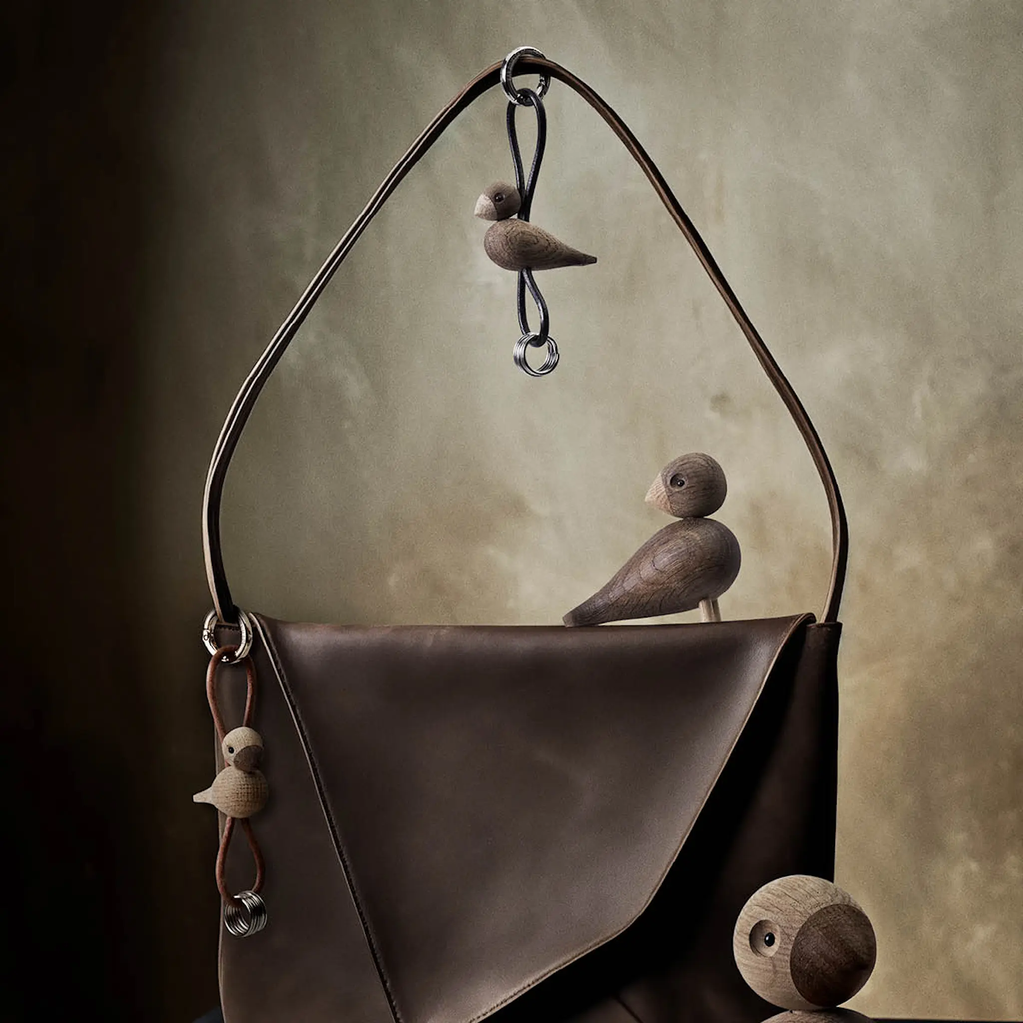 Kay Bojesen Denmark Fågel nyckelring 6x4,5 cm silver/svart/rökt ek