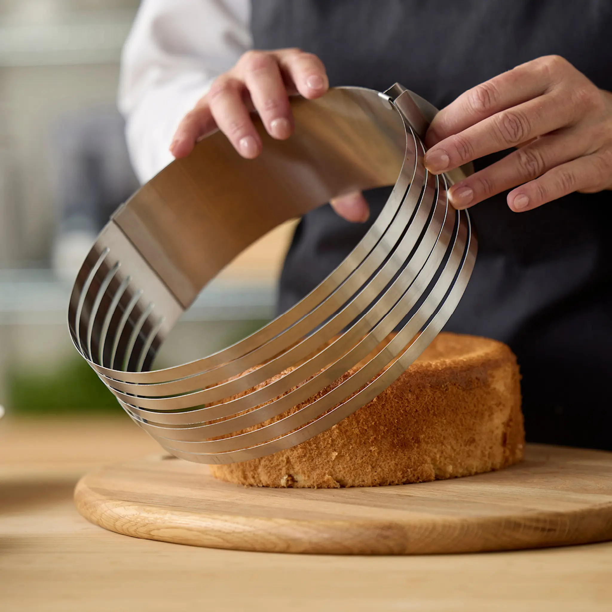 Blomsterberg Justerbar tårtdelare 24-30x8 cm stål