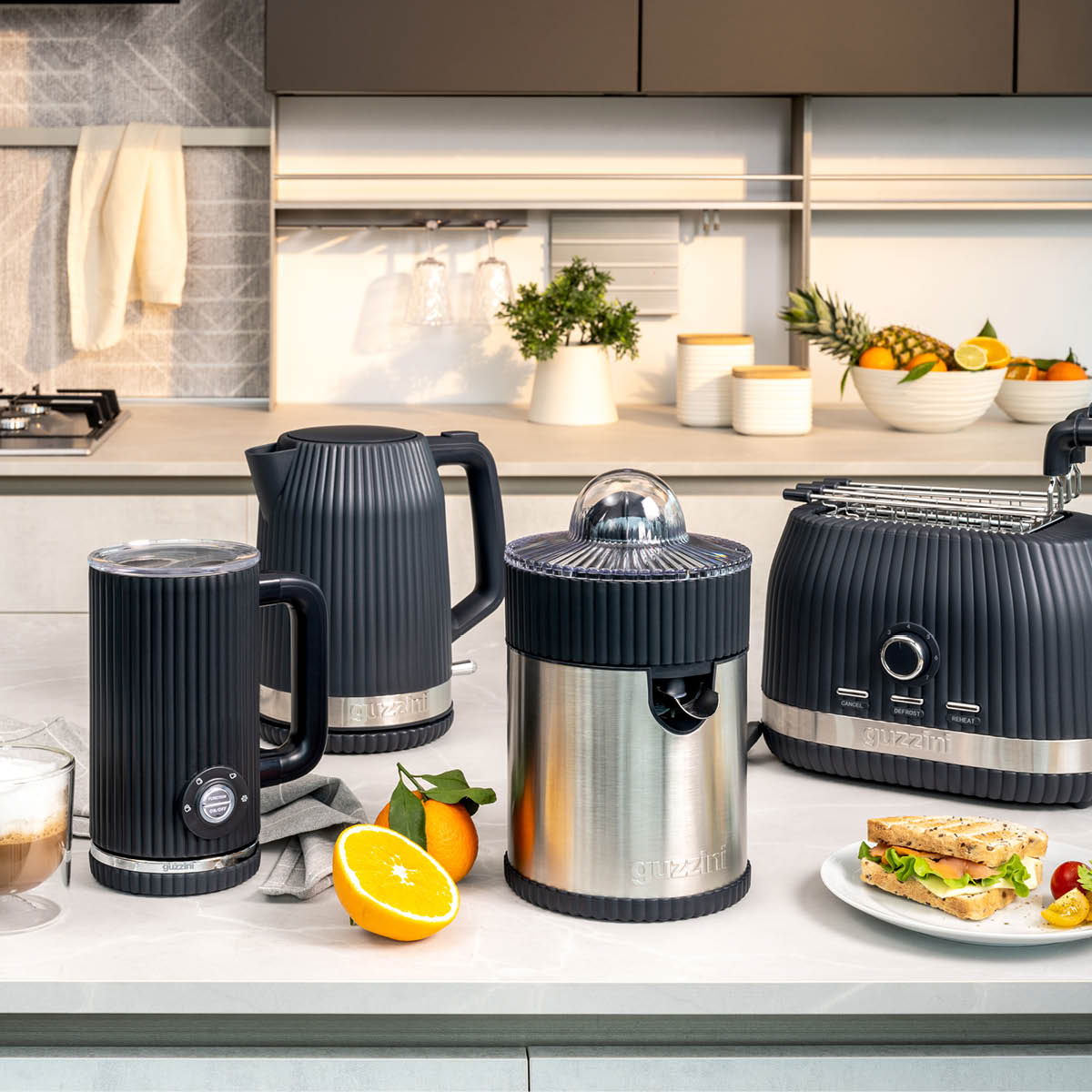 Guzzini Sous Chef juicepress elektrisk 100W grå