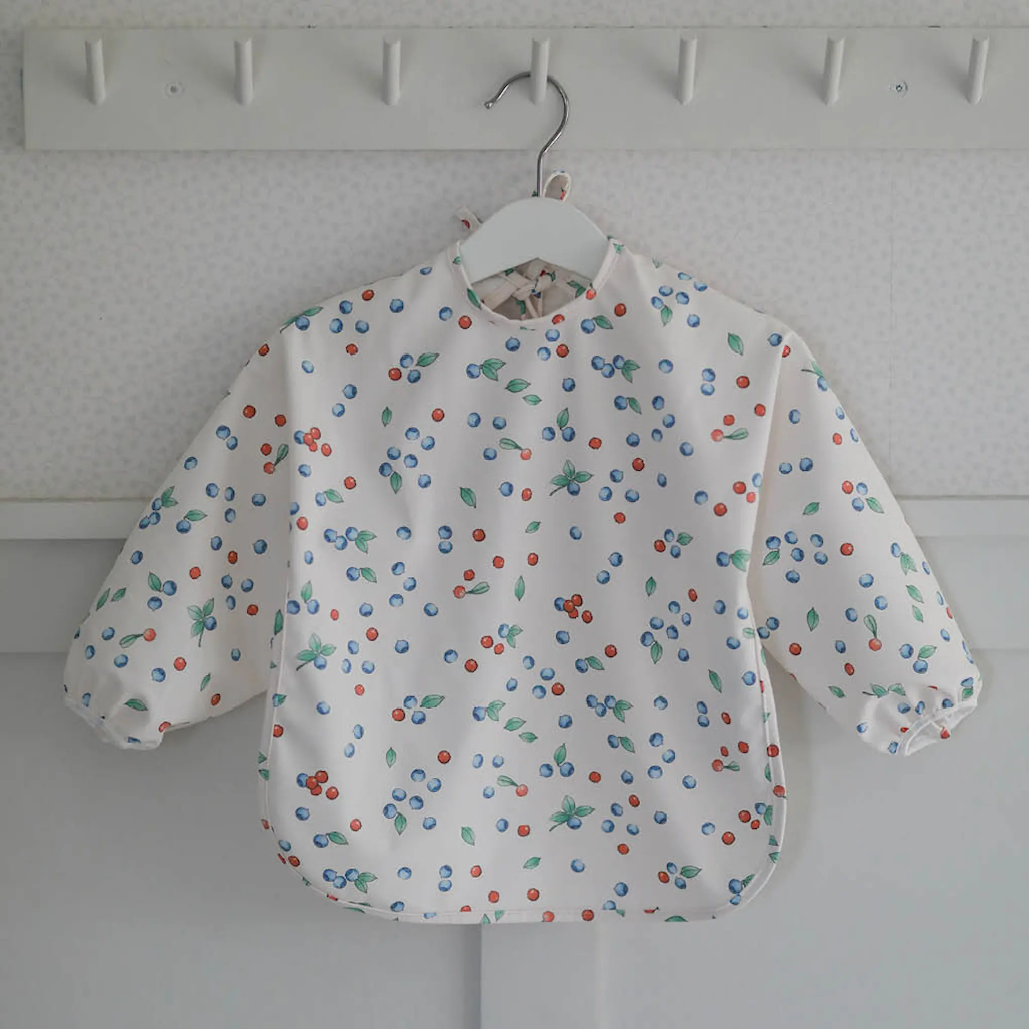 Rätt Start Beskow långärmad haklapp Putte i Blåbärsskogen