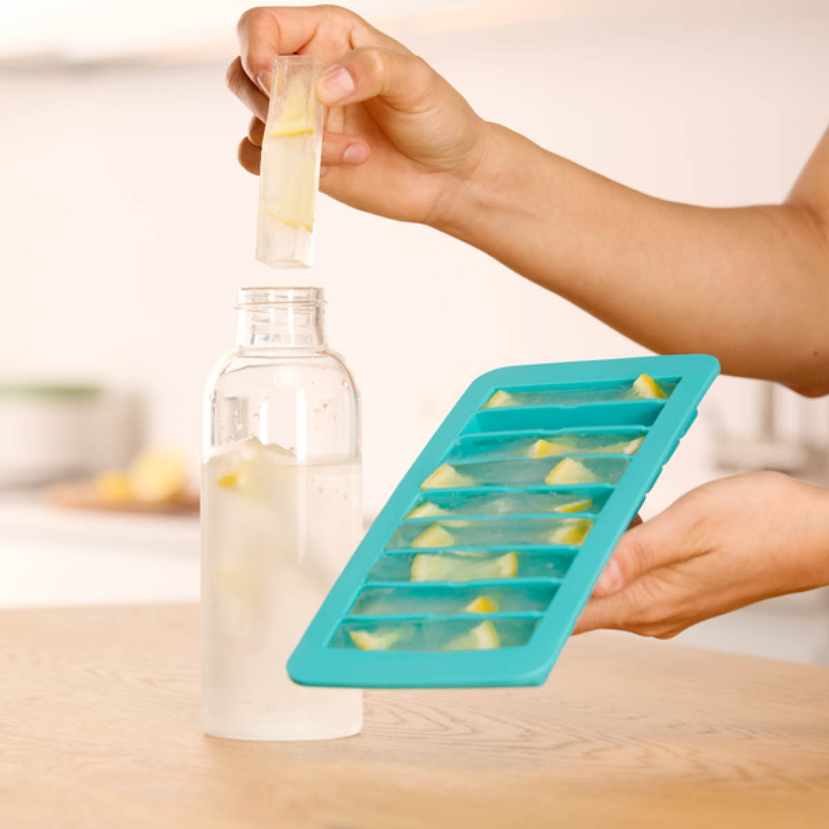 Lékué Isform med lock 9 stavar turkos