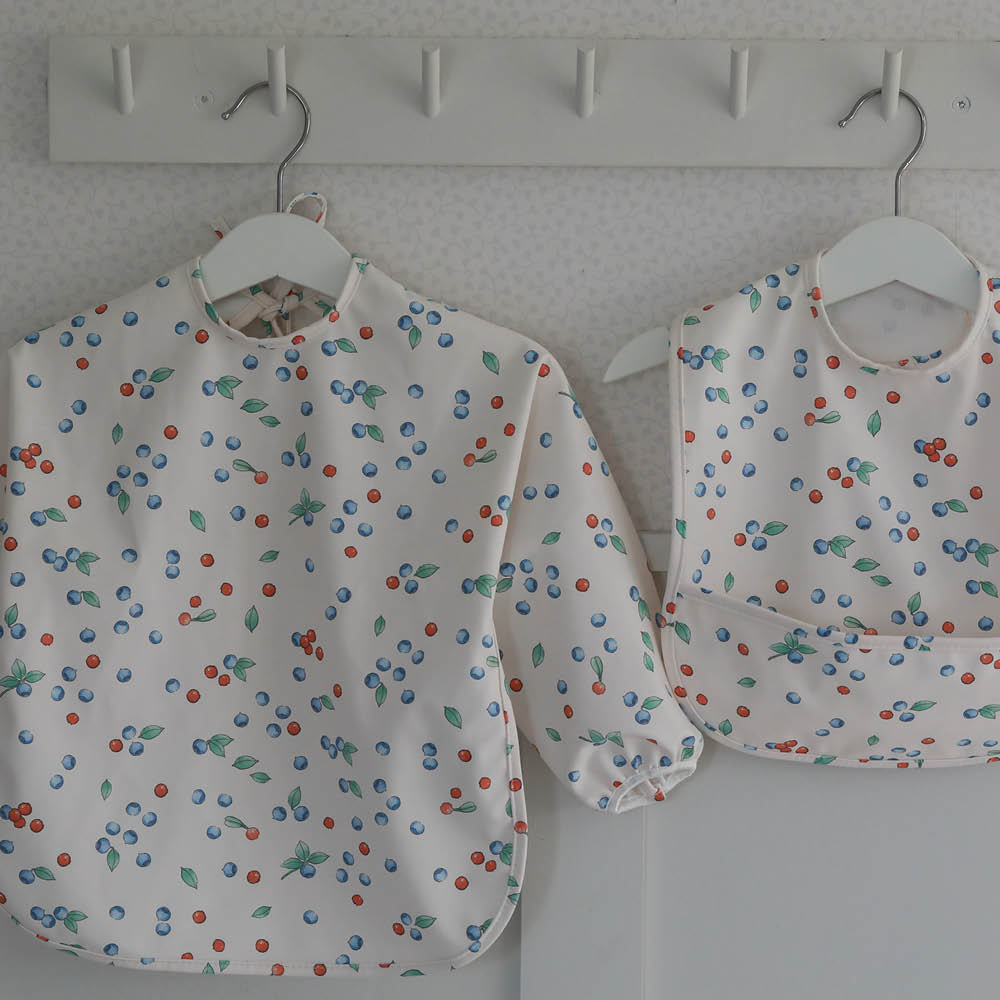 Rätt Start Beskow långärmad haklapp Putte i Blåbärsskogen