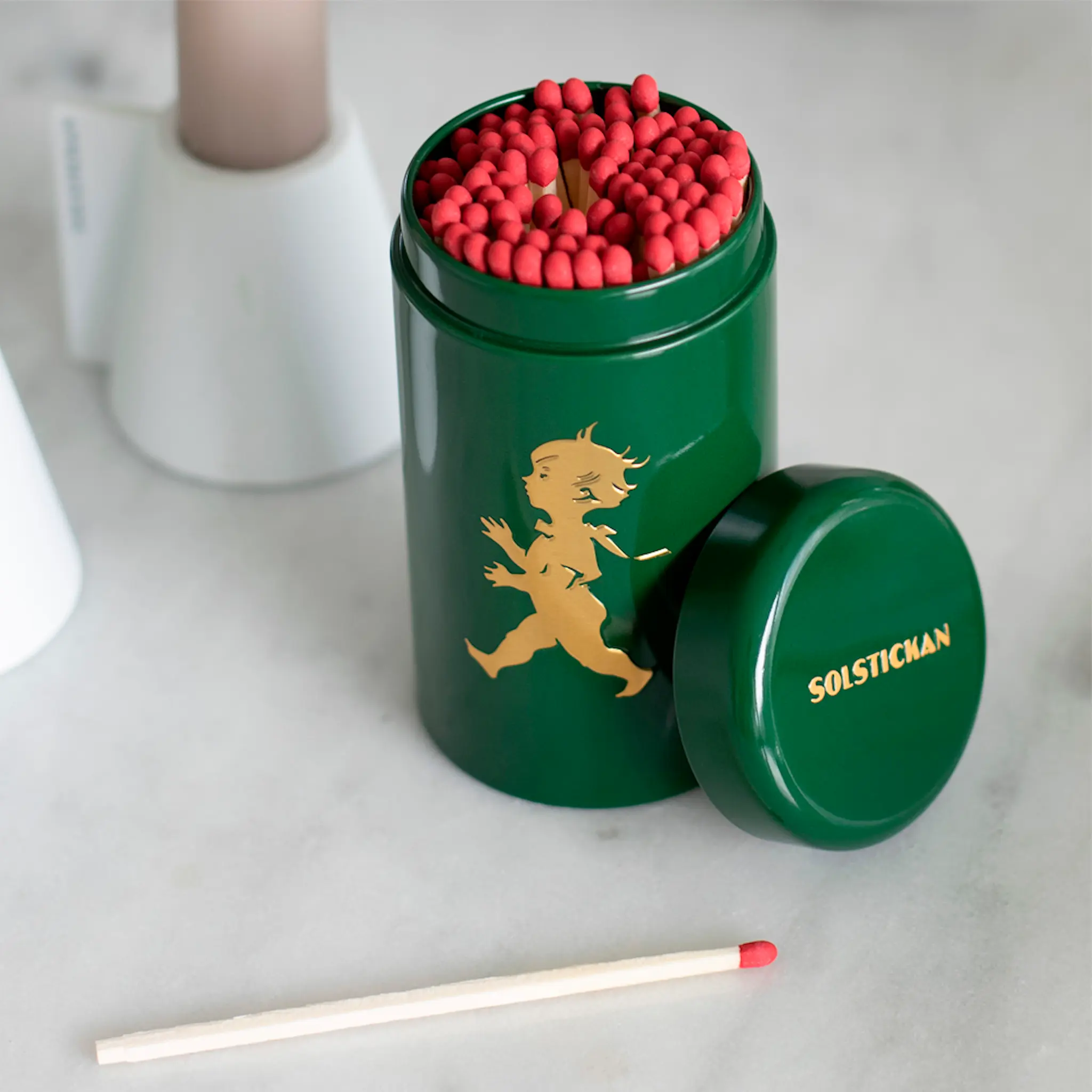 SOLSTICKAN Fyrstikker i boks grønn/gull