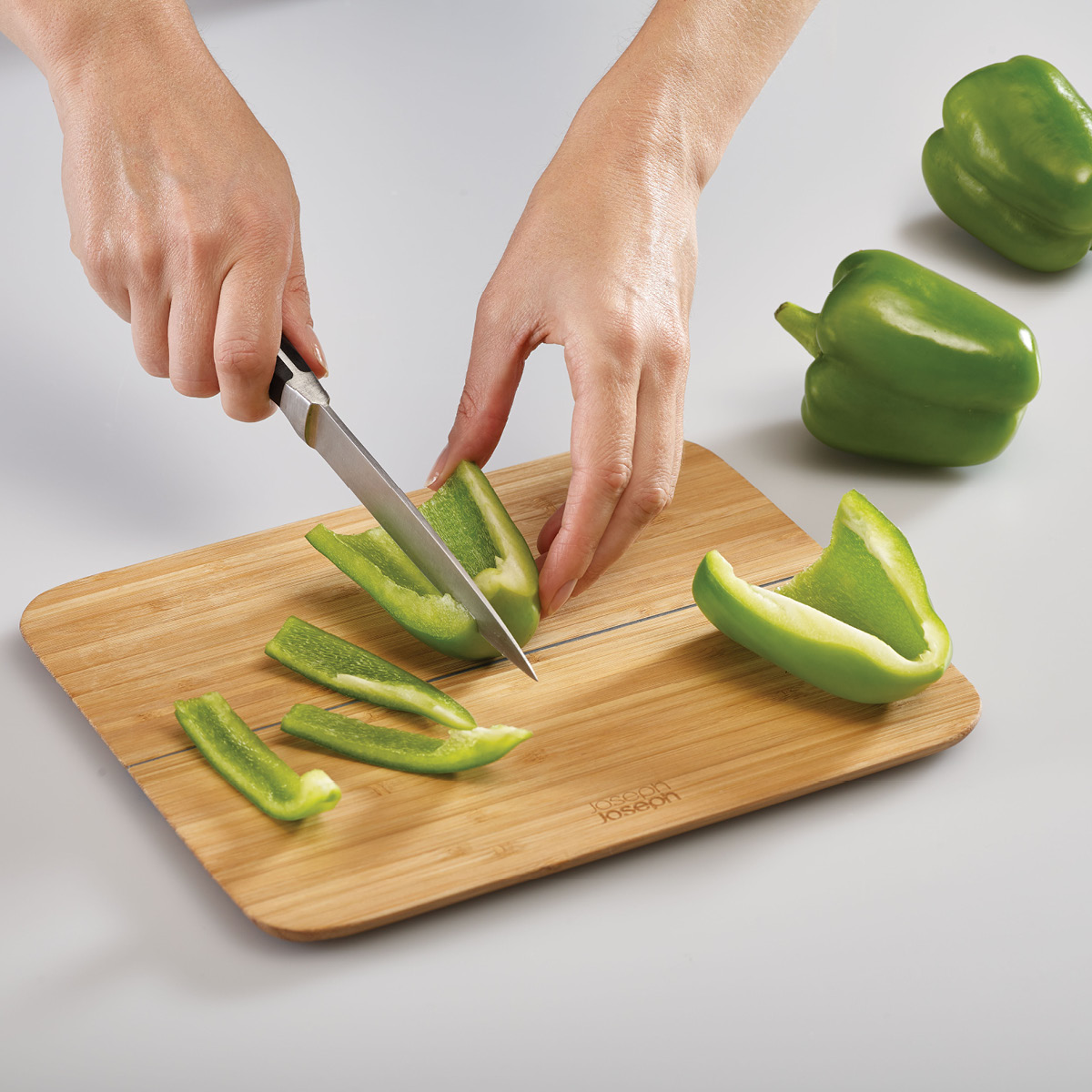 Joseph Joseph Chop2Pot skjærefjøl i tre 33x27 cm tre