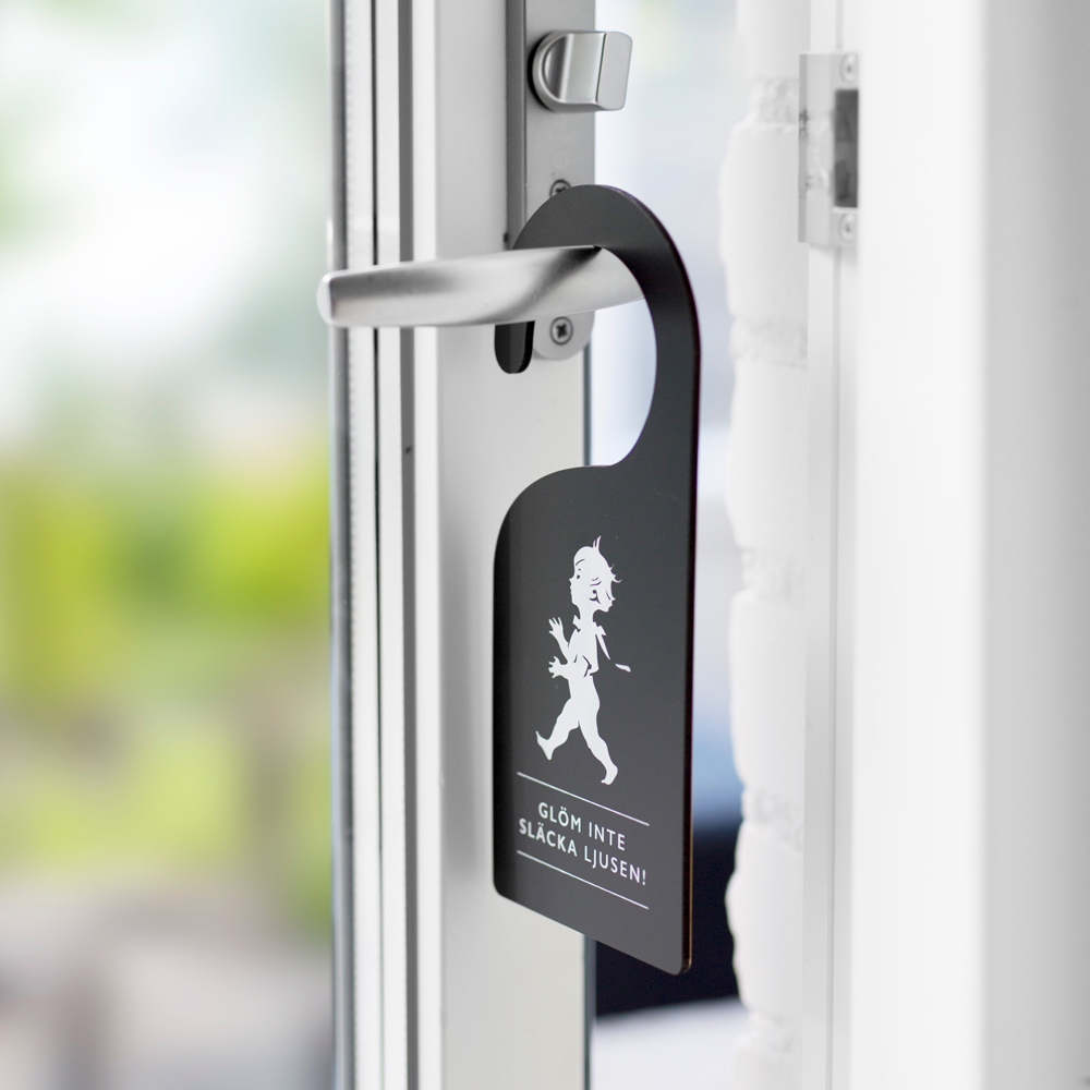 SOLSTICKAN Dørhenger svart/hvit