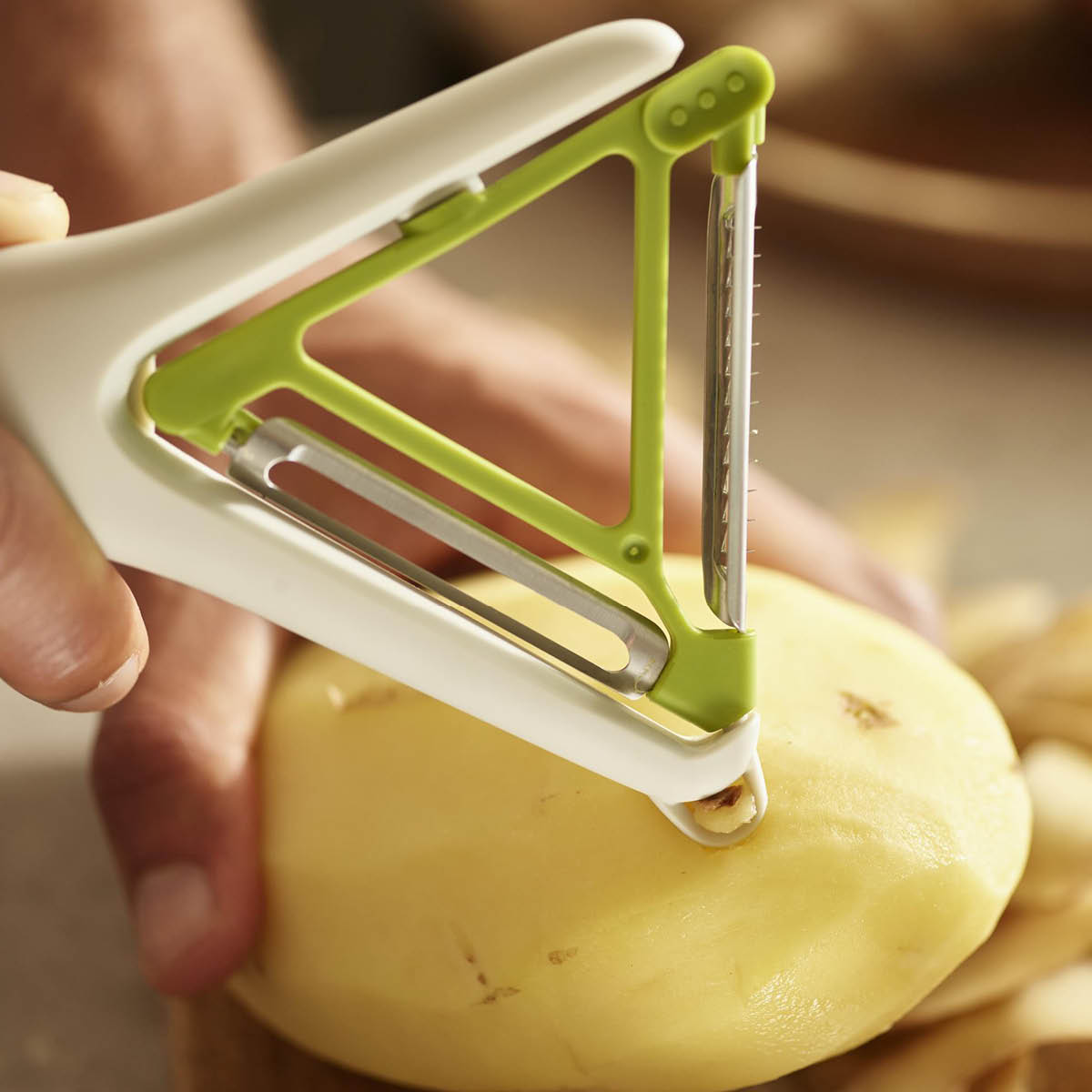 Joseph Joseph 2 i 1 skreller 16 cm hvit/grønn