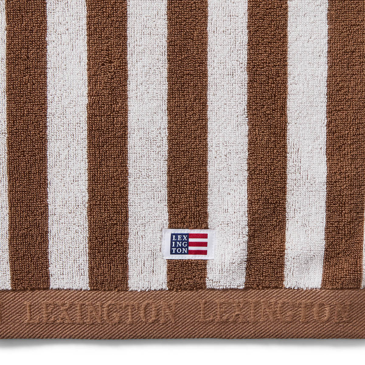 Lexington Stripet frottéhåndkle 50x70 cm fudge/snow white