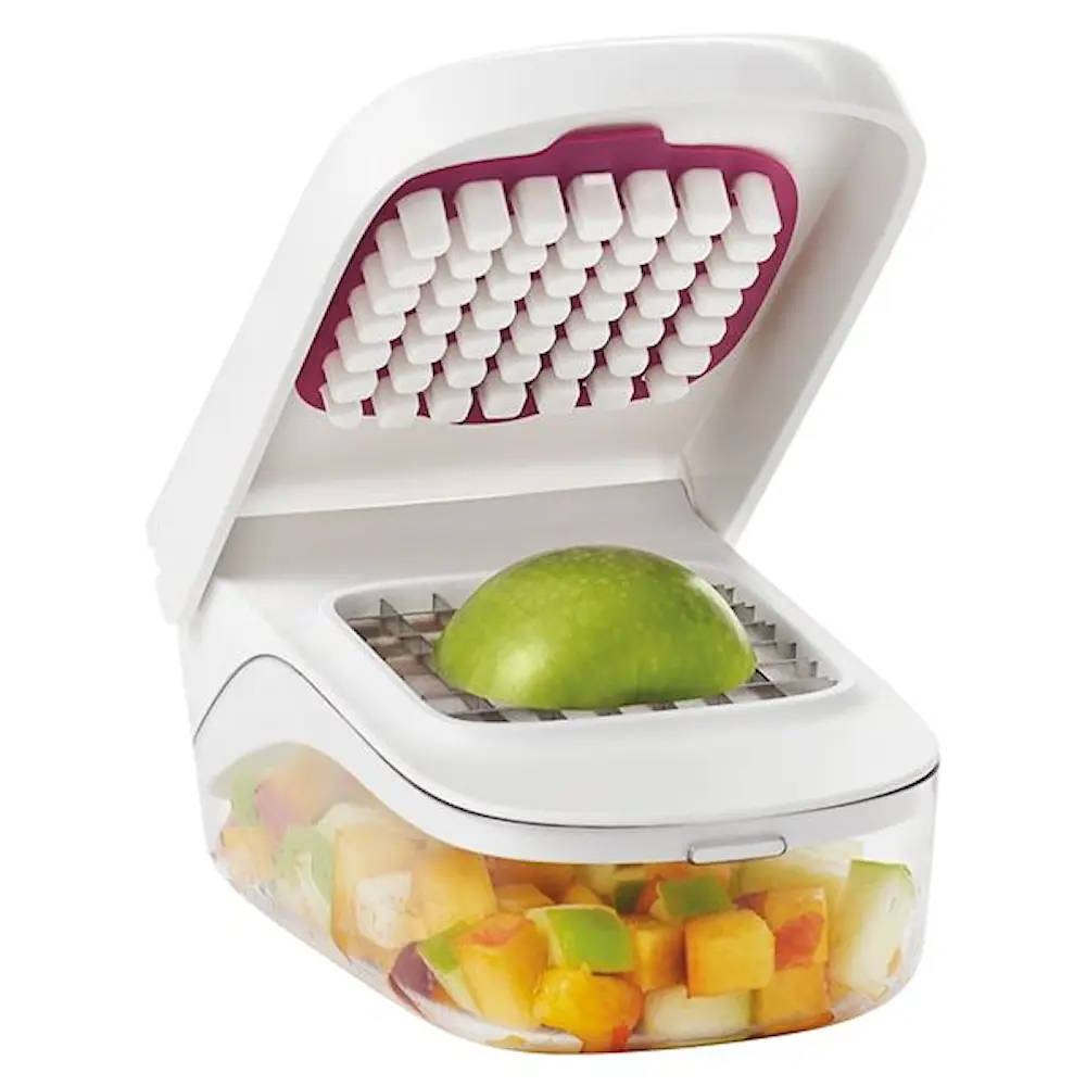 Vihannesleikkuri säiliöllä