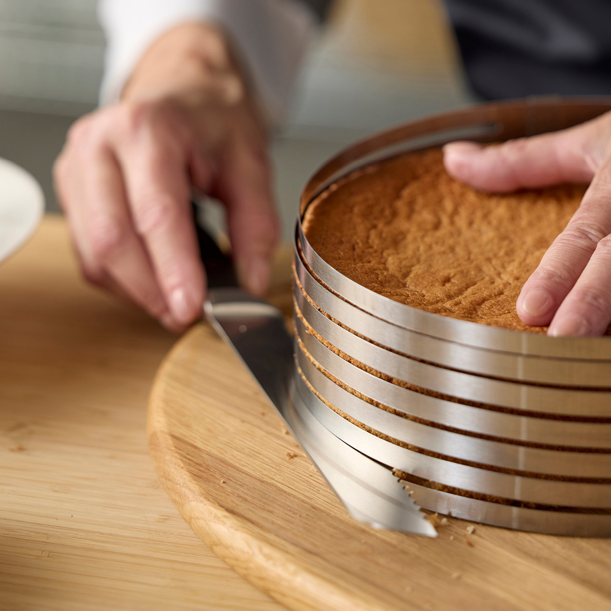 Blomsterberg Justerbar tårtdelare 24-30x8 cm stål