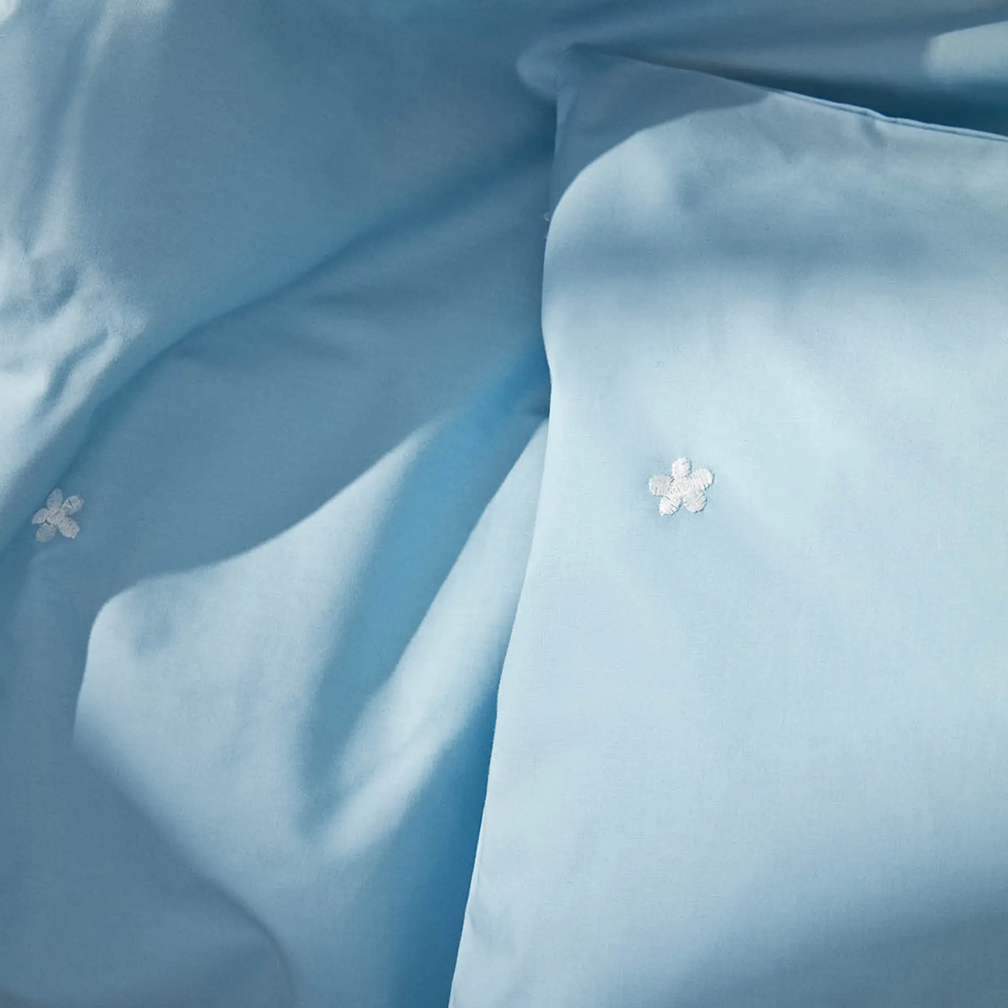 Juna Daisy påslakanset 150x210 cm ljusblå