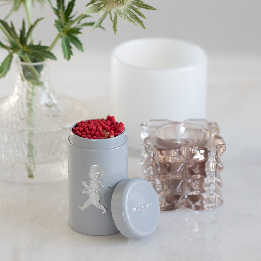 SOLSTICKAN Fyrstikker i boks grå