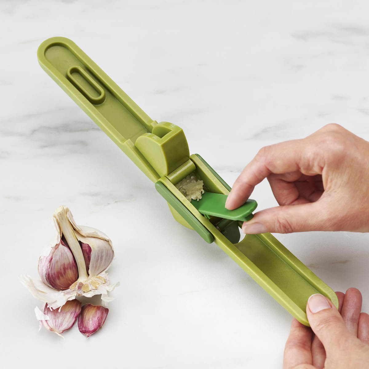 Joseph Joseph Duo vitlökspress 16 cm grön
