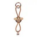 Apa nyckelring 5x3 cm guld/natur/teak/limba