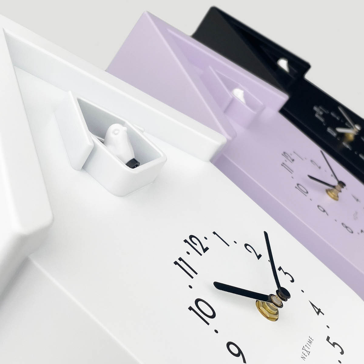 NeXtime Twitter väggklocka 21,5x41,5 cm vit