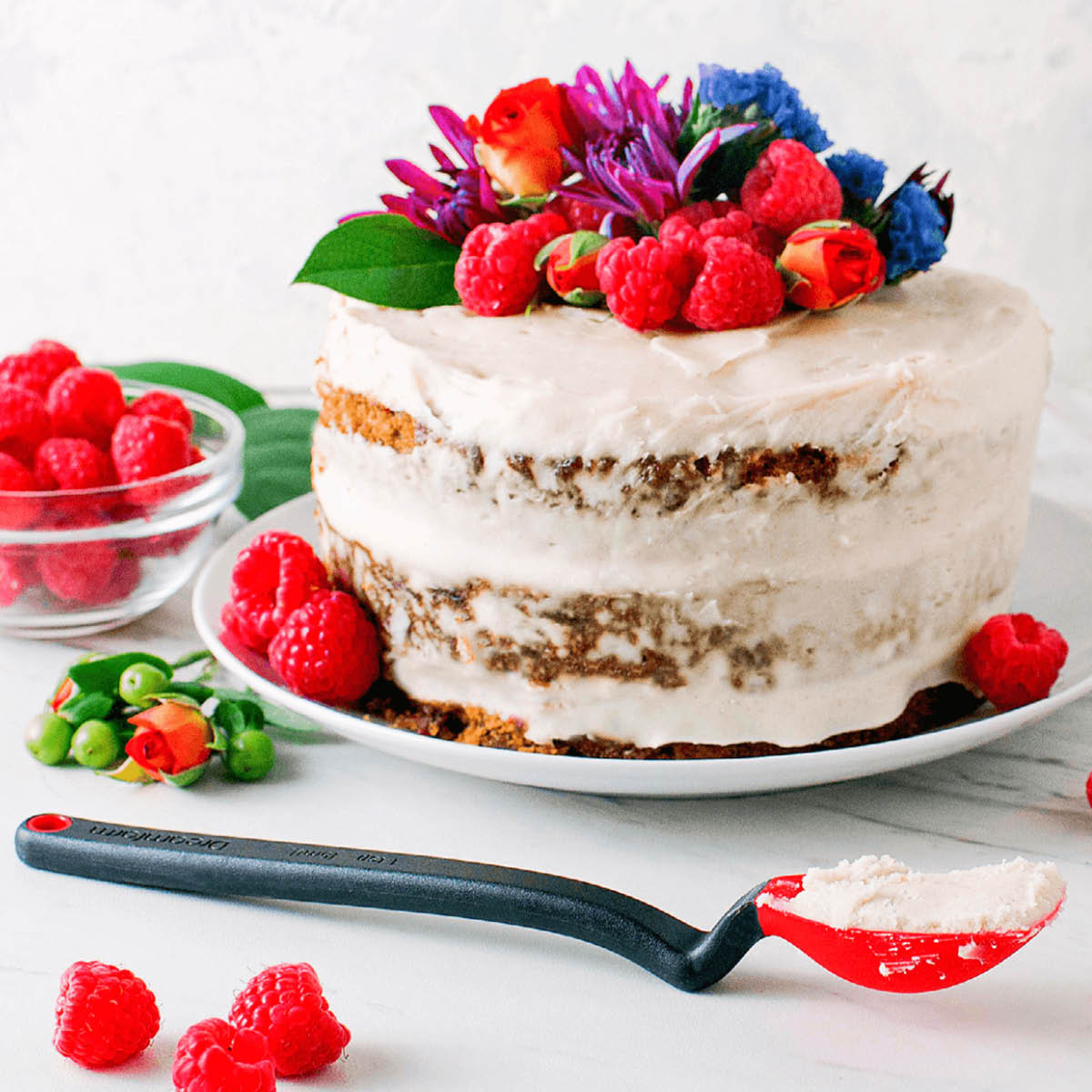 Dreamfarm Silikonsked med vinklat skaft liten 20 cm röd