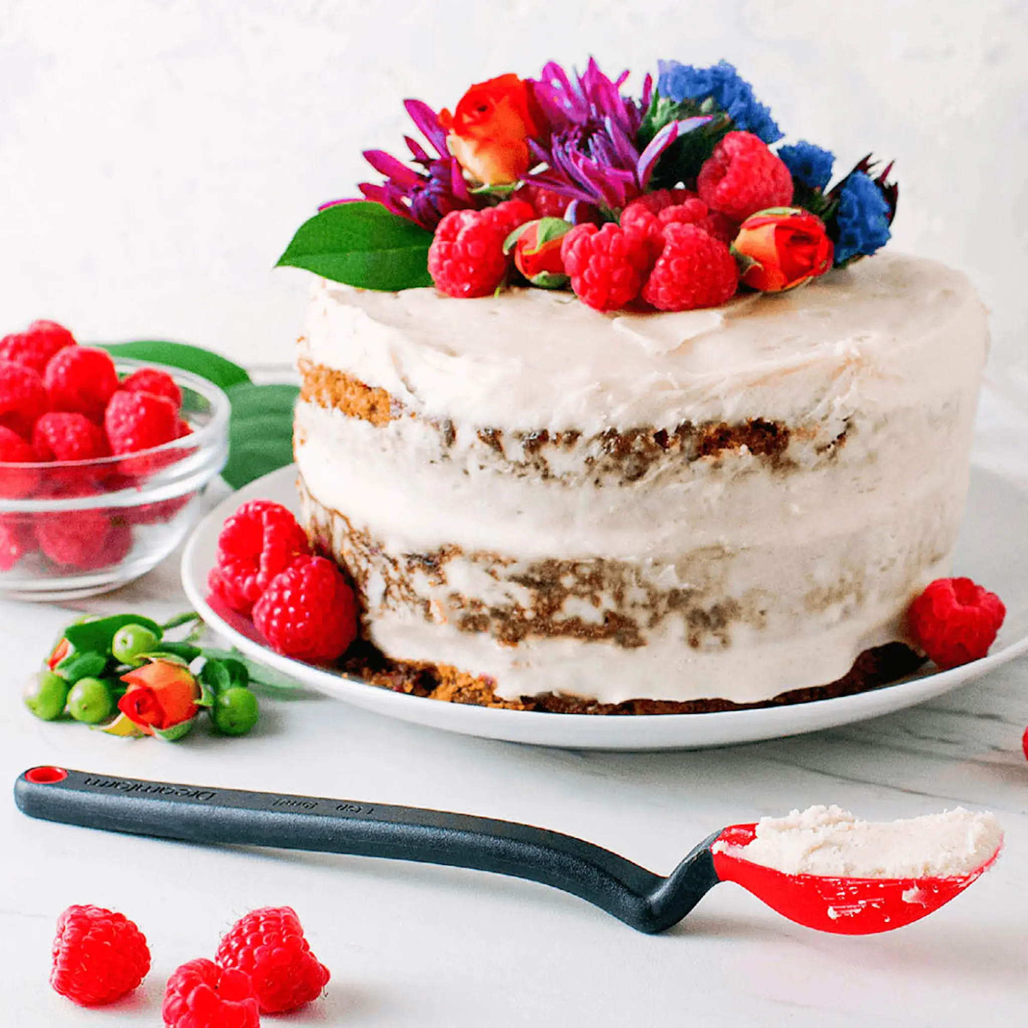 Dreamfarm Silikonsked med vinklat skaft liten 20 cm röd