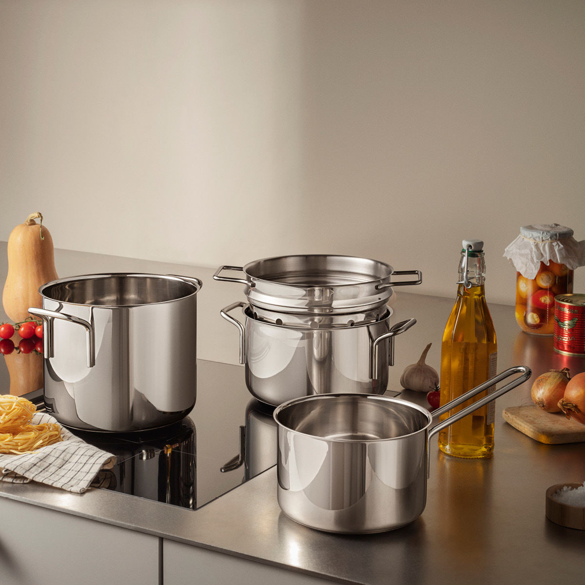 Eva Trio Stainless Steel kastrullset 4 delar med pastainsats