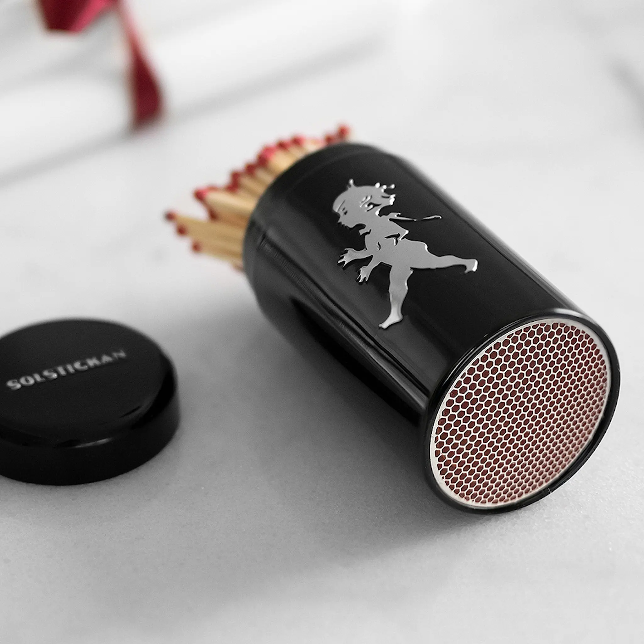 SOLSTICKAN Tulitikut purkissa Musta